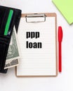 PPP Loan Salary Protection Program Concept. Wallet with money on a blank. Royalty Free Stock Photo
