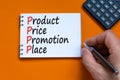 PPPP product price promotion place symbol. Concept words PPPP product price promotion place on the note on beautiful orange