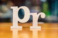 PR Alphabet on Blur Background Public Relations