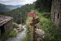 PR2 and PR5 LSA Lousa walking trails - wooden signpost pointing the way and distances to Talasnal Schist Village and the Castle