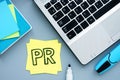 PR public relations concept. Workplace with laptop Royalty Free Stock Photo