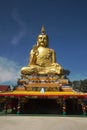 Pra Put Ratanamani Srihathai Naresuan large golden sitting outdoor Buddha in Wat Maniwong.