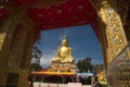 Pra Put Ratanamani Srihathai Naresuan large golden sitting outdoor Buddha in Wat Maniwong.