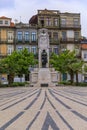 Praca de Carlos Alberto square with ornate cobblestone design leading up to the Monument to the Dead of the Great War