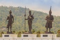 Prachuap Khiri Khan, Thailand - March 16, 2017: The bronze statues three of seven Thai kings in the mountain and blue sky Royalty Free Stock Photo