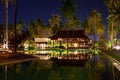 The resort building has a large swimming pool and beautifully decorated coconut