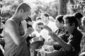 Prachuapkhirikhan, Thailand - November 16, 2015 : Unidentified man of Buddhist offer foods to a monk for make merit