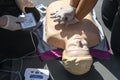 Practical classes on providing emergency medical care on a special mannequin. Technique of indirect heart massage.