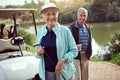 Practice makes perfect. Portrait of a smiling senior couple enjoying a day on the golf course. Royalty Free Stock Photo