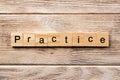 Practice word written on wood block. practice text on table, concept Royalty Free Stock Photo