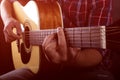 Practicing in playing guitar. Handsome young men playing guitar Royalty Free Stock Photo