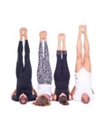 Practicing Yoga exercises in group / Shoulderstand - Sarvangasana - Viparita Karani Royalty Free Stock Photo