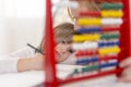 Practising math with abacus Royalty Free Stock Photo