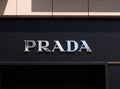Prada logo on front store in shopping street. Prada is a world famous fashion brand founded in Italy. Royalty Free Stock Photo
