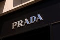 Prada logo on front store in shopping street. Prada is a world famous fashion brand founded in Italy. Royalty Free Stock Photo