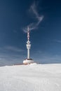 Praded hill with communication tower in winter Jeseniky mountains in Czech republic Royalty Free Stock Photo