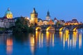 Prague architecture and Charles bridge over Vltava river at night, Czech Republic Royalty Free Stock Photo