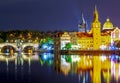 Prague architecture and Charles bridge over Vltava river at night, Czech Republic Royalty Free Stock Photo