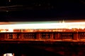 Prague bridge with moving subject at night