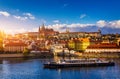 Prague Castle, Charles Bridge and boats on the Vltava river. View of Hradcany Prague Castle, Charles Bridge and a boats on the