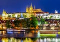 Prague castle with St. Vitus cathedral and Charles bridge at night, Czech Republic Royalty Free Stock Photo