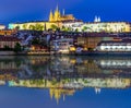 Prague Castle with St. Vitus Cathedral over Lesser town Mala Strana reflected in Vltava river, Czech Republic Royalty Free Stock Photo