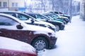 Prague city street under the snow. Cars driving on a blizzard road. Snow calamity in the city. Snow covered cars. Winter Royalty Free Stock Photo