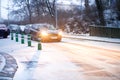 Prague city street under the snow. Cars driving on a blizzard road. Snow calamity in the city. Snow covered cars. Winter Royalty Free Stock Photo