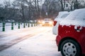 Prague city street under the snow. Cars driving on a blizzard road. Snow calamity in the city. Snow covered cars. Winter Royalty Free Stock Photo