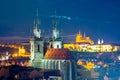 Prague cityscape at night with church of Our Lady before Tyn and Prague castle at background, Czech Republic