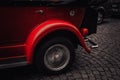 Prague. 10.05.2019: Classic retro car stands on the street at the exhibition. Multi-colored, red vintage. The concept of antiquity Royalty Free Stock Photo
