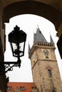 Prague Clock tower and street lamp on a cloudy day in autumn