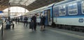 People boarding one of the blue trains of the national carrier in Czech republic, Ceske drahy, at the Prague main train station