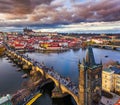 Prague, Czech Republic - Aerial drone view of the world famous Charles Bridge Karluv most above River Vltava at sunset Royalty Free Stock Photo
