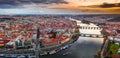 Prague, Czech Republic - Aerial panoramic drone view of city of Prague at dusk. Red rooftops, the famous Charles Bridge Royalty Free Stock Photo