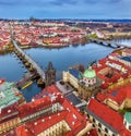 Prague, Czech Republic - Aerial panoramic drone view of the world famous Charles Bridge and St. Francis Of Assisi Church Royalty Free Stock Photo