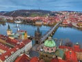 Prague, Czech Republic - Aerial panoramic drone view of the world famous Charles Bridge and St. Francis Of Assisi Church Royalty Free Stock Photo