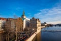 Golden light over the beautiful old town of Prague city during sunset at early spring seen from Charles Bridge Royalty Free Stock Photo