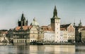 Prague Czech Republic April 27, 2017. Karlov Bridge Clock Tower view from the river Vltava toning vintage postcard