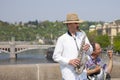 Prague, Czech Republic - April 19, 2011: Quartet of Musicians playing musical instruments for tourists on the street in Prague Royalty Free Stock Photo