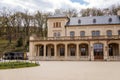 Prague, Czech Republic, 25 April 2021:  Slechtas or Slechtova restaurant with green lawn, Lower summer house baroque palace at Royalty Free Stock Photo