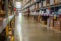 Prague, Czech republic - August 6, 2023: Long shelves with many cardboard boxes with product in warehouse of IKEA