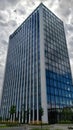 High-rise office building made of glass and steel during cloudy weather