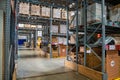 Prague, Czech republic - August 6, 2023: Long shelves with many cardboard boxes with product in warehouse of IKEA