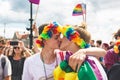 Prague, Czech Republic - August 11, 2018: Participants of the annual Prague Gay Pride parade. Gay couple kissing in a crowd Royalty Free Stock Photo