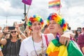 Prague, Czech Republic - August 11, 2018: Participants of the annual Prague Gay Pride parade. Gay couple in a crowd Royalty Free Stock Photo