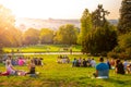 PRAGUE, CZECH REPUBLIC - AUGUST 17, 2018: Sunset in Rieger Gardens, Riegrovy sady, in Prague. Many people sitting in the