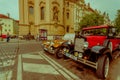 Prague, Czech Republic - 13 August, 2015: Two classic beautiful cars parked on street across from famous Church Royalty Free Stock Photo