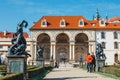 Unidentified people visit Wallenstein Palace currently the home of the Czech Senate in P