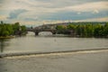 Prague, Czech Republic: Beautiful view of the old town. Panoramic landscape with houses, churches, trees and a river